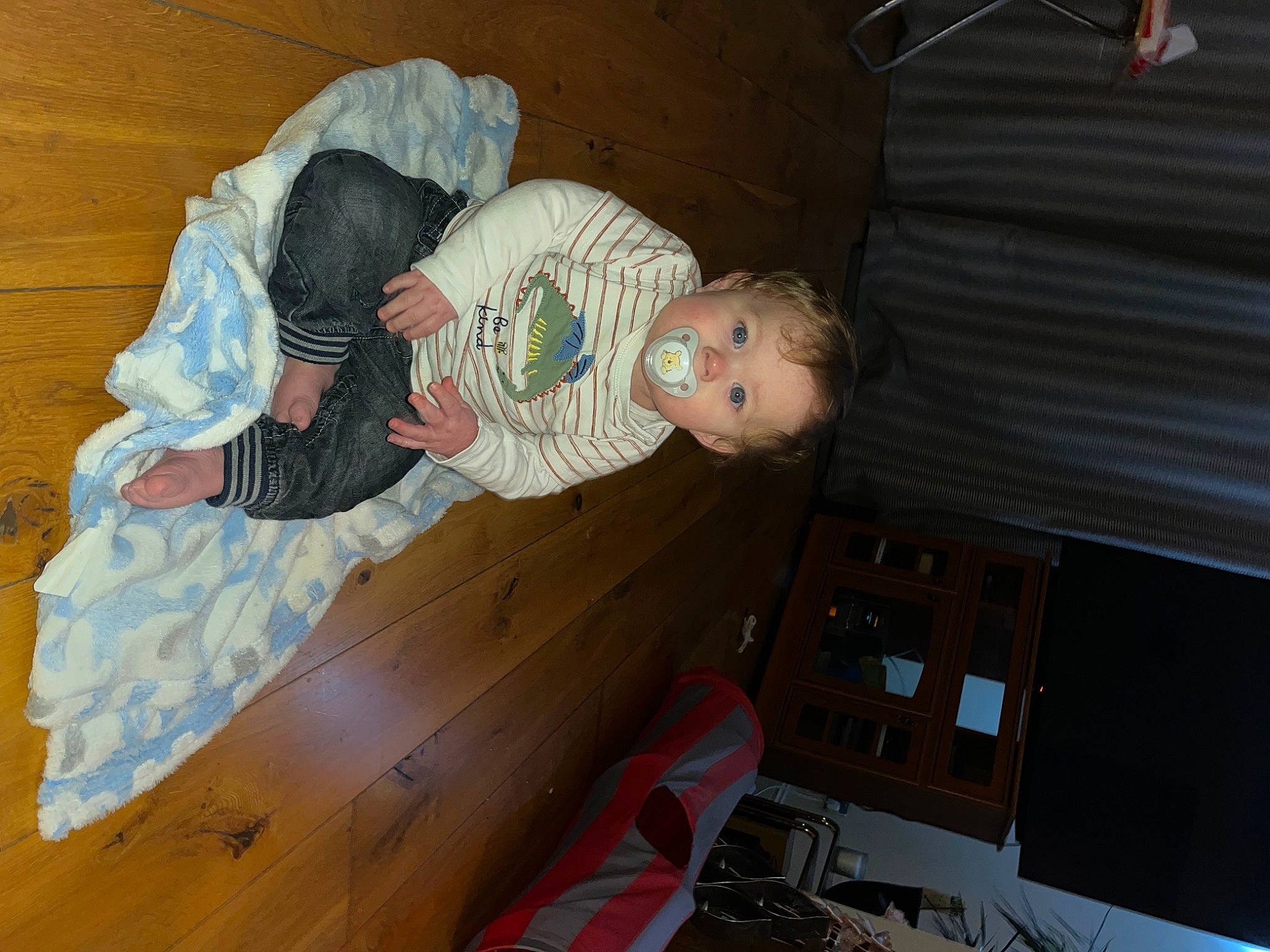 Mason joined the competition — help win amazing prizes! baby, baby_products, baby_toddler_clothing, child, comfort, flooring, hardwood, pattern, person, room, toddler, toy, wood