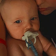 Corey joined the competition — help win amazing prizes! baby, infant, adult, parent, face, portrait, closeup, cuddling, pacifier, baby_bottle, blue_eyes, brown_hair, indoor, selfie, family, caregiver, skin, baby_clothing, affection, smartphone_photo