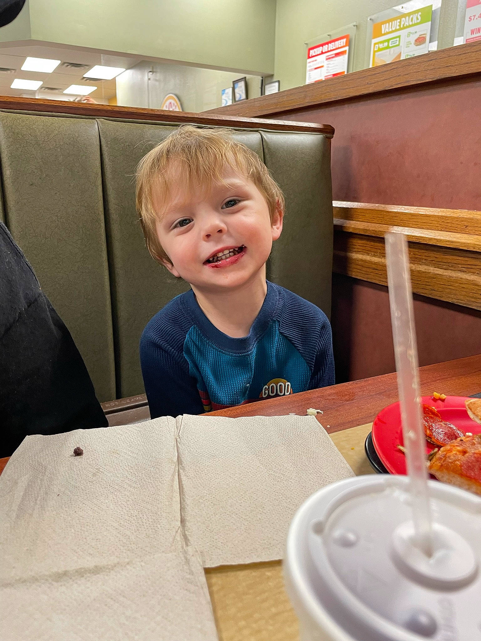 Charlie joined the competition — help win amazing prizes! chair, child, comfort_food, design, drawer, event, facial_expression, flooring, food, fun, joy, person, plate, play, room, sitting, smile, t_shirt, table, tableware