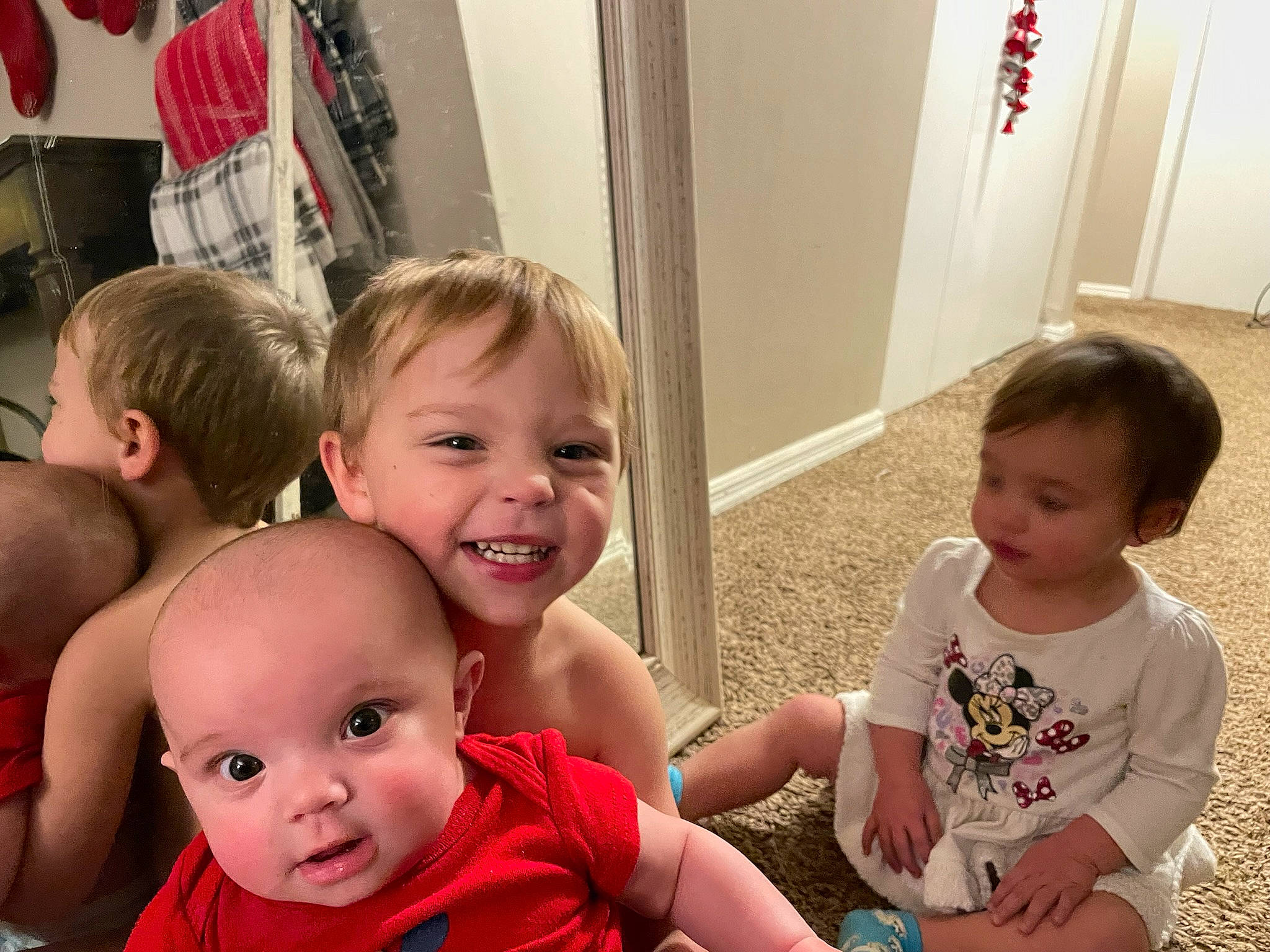 Charlie is registered to the contest to win money with this photo: cheek, chin, door, face, facial_expression, fun, hairstyle, happy, human, interaction, iris, joy, mouth, nose, person, sharing, skin, smile, social_group, standing