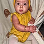 Alayah-Ray is registered to the contest to win money with this photo: baby, child, headband, yellow, bow, bracelet, blanket, teddy_bear, tights, sitting, cute, infant, portrait, clothing, hand, face, expression, indoors, soft, cozy