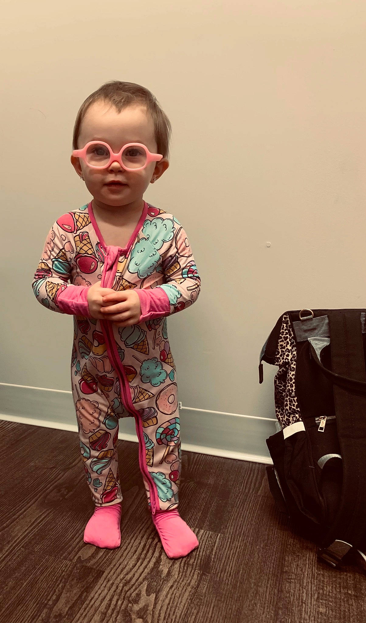 Hadlee is registered to the contest to win money with this photo: active_pants, cool, eyewear, finger, goggles, hairstyle, happy, human_body, joint, knee, neck, outerwear, person, pink, shoulder, sleeve, standing, sunglasses, t_shirt, vision_care