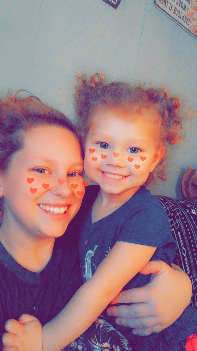 Keona is registered to the contest to win money with this photo: arm, cheek, child, electric_blue, event, face, flash_photography, fun, gesture, happy, iris, joy, laugh, lip, person, purple, sitting, skin, smile, t_shirt