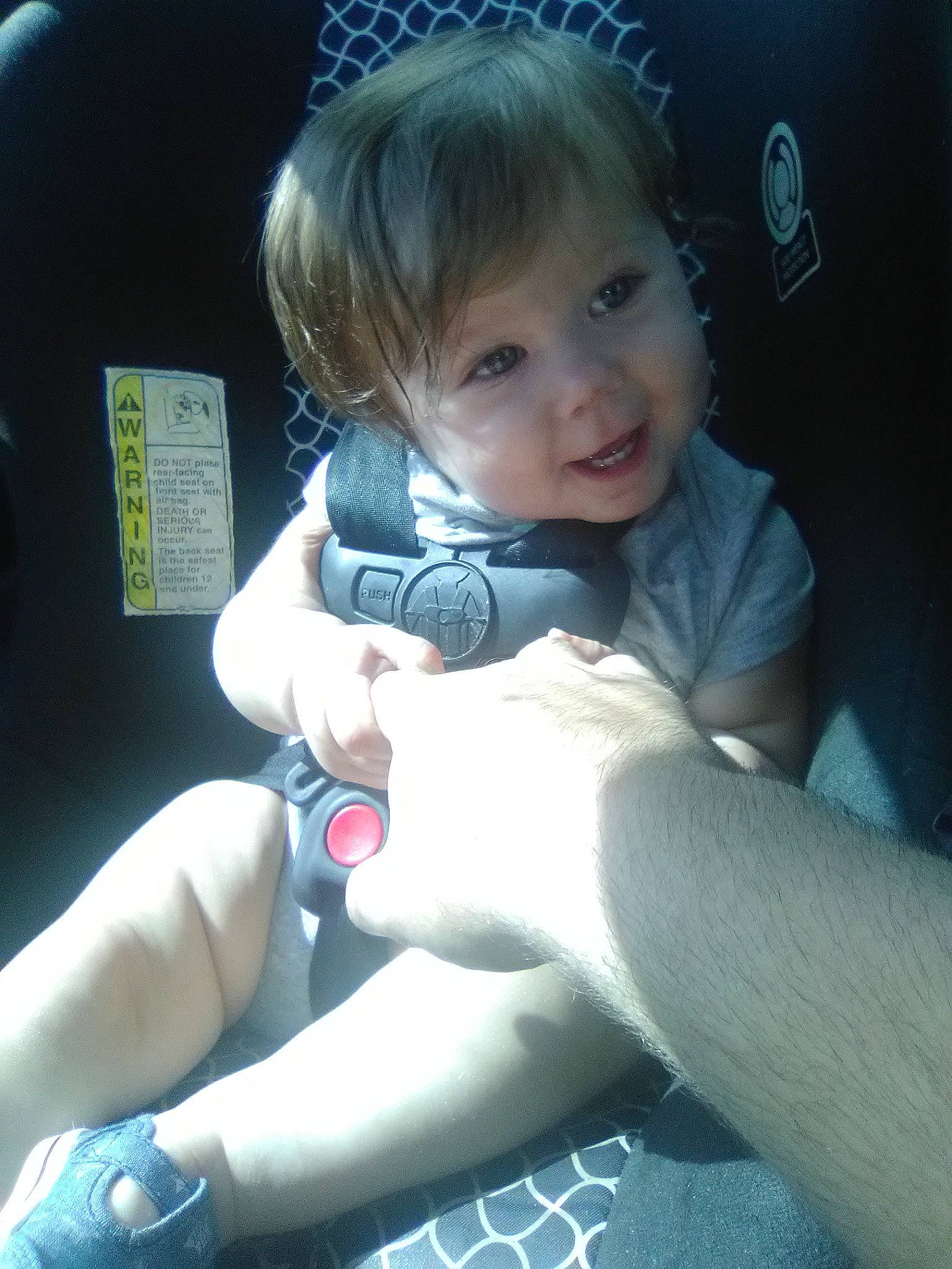 Briley is registered to the contest to win money with this photo: arm, baby, child, ear, electronic_device, fun, hand, leg, person, skin, technology, toddler, vacation