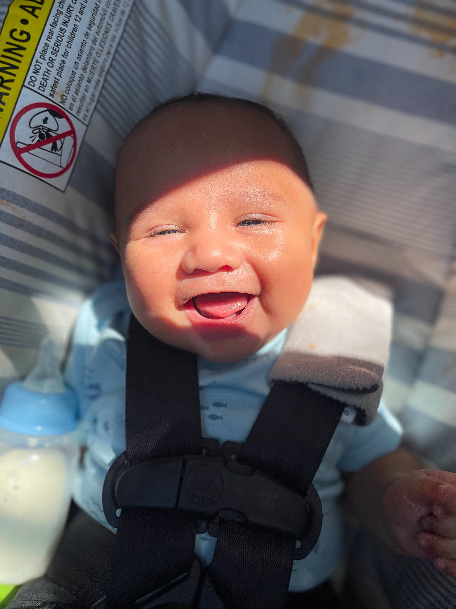 Adriel joined the competition — help win amazing prizes! baby, baby_carriage, cap, car_seat, cheek, child, comfort, eye, finger, happy, hat, headgear, headwear, mouth, nose, outerwear, person, seat_belt, skin, smile