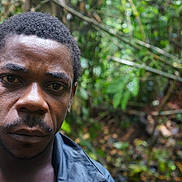 Nigger is registered to the contest to win money with this photo: beard, botany, chin, face, facial_hair, forehead, forest, grass, happy, jungle, moustache, necklace, people_in_nature, plant, portrait_photography, terrestrial_animal, terrestrial_plant, tree, wildlife, wrinkle