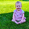 baby, child, grass, outdoor, smile, happy, sitting, pink_clothing, sunlight, greenery, cute, portrait, nature, infant, young_child, garden, playful, casual, daytime, baby_girl