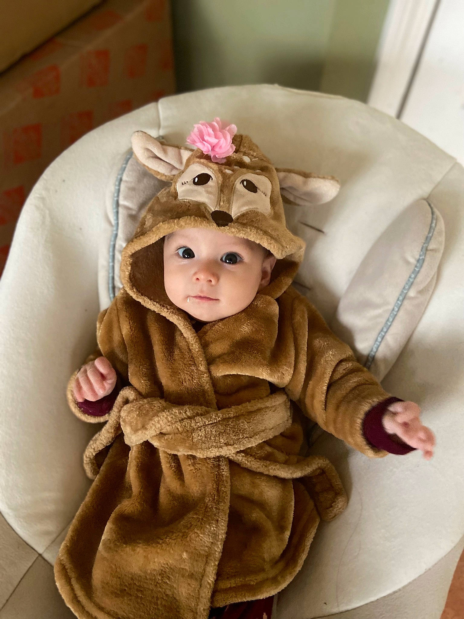 Ella is registered to the contest to win money with this photo: baby, baby_products, baby_toddler_clothing, cap, child, costume, costume_hat, dress, embellishment, fashion_accessory, fur, hair_accessory, hat, head, headpiece, headwear, pattern, person, plant, sleeve