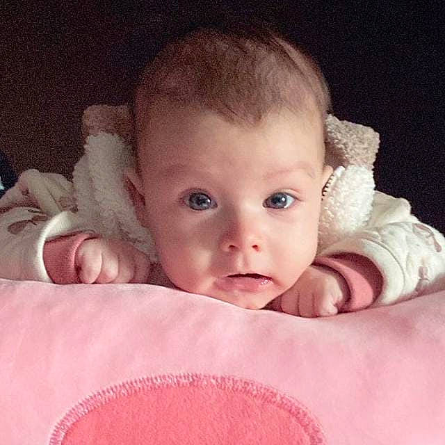 Ella joined the competition — help win amazing prizes! baby, baby_sleeping, baby_toddler_clothing, cheek, comfort, eye, eyelash, finger, flash_photography, happy, head, iris, linens, lip, nose, person, pink, sleeve, textile, thumb