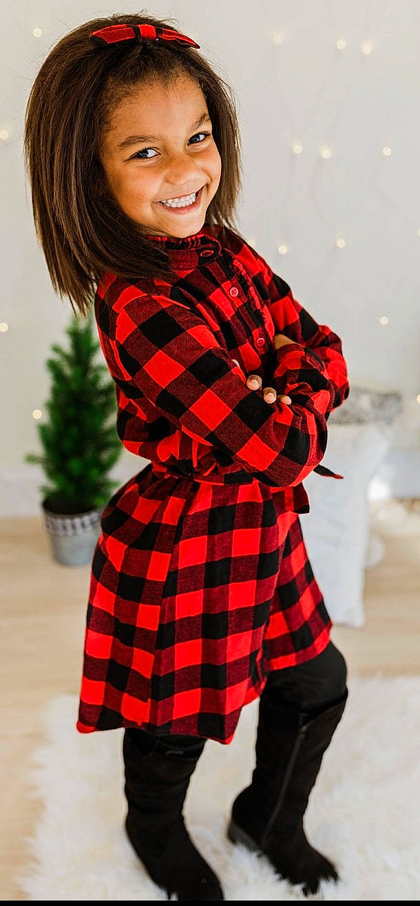 Chasity is registered to the contest to win money with this photo: brown_hair, child, child_model, christmas, clothing, coat, design, dress, joy, neck, outerwear, pattern, person, plaid, red, sleeve, tartan, textile, toddler, waist
