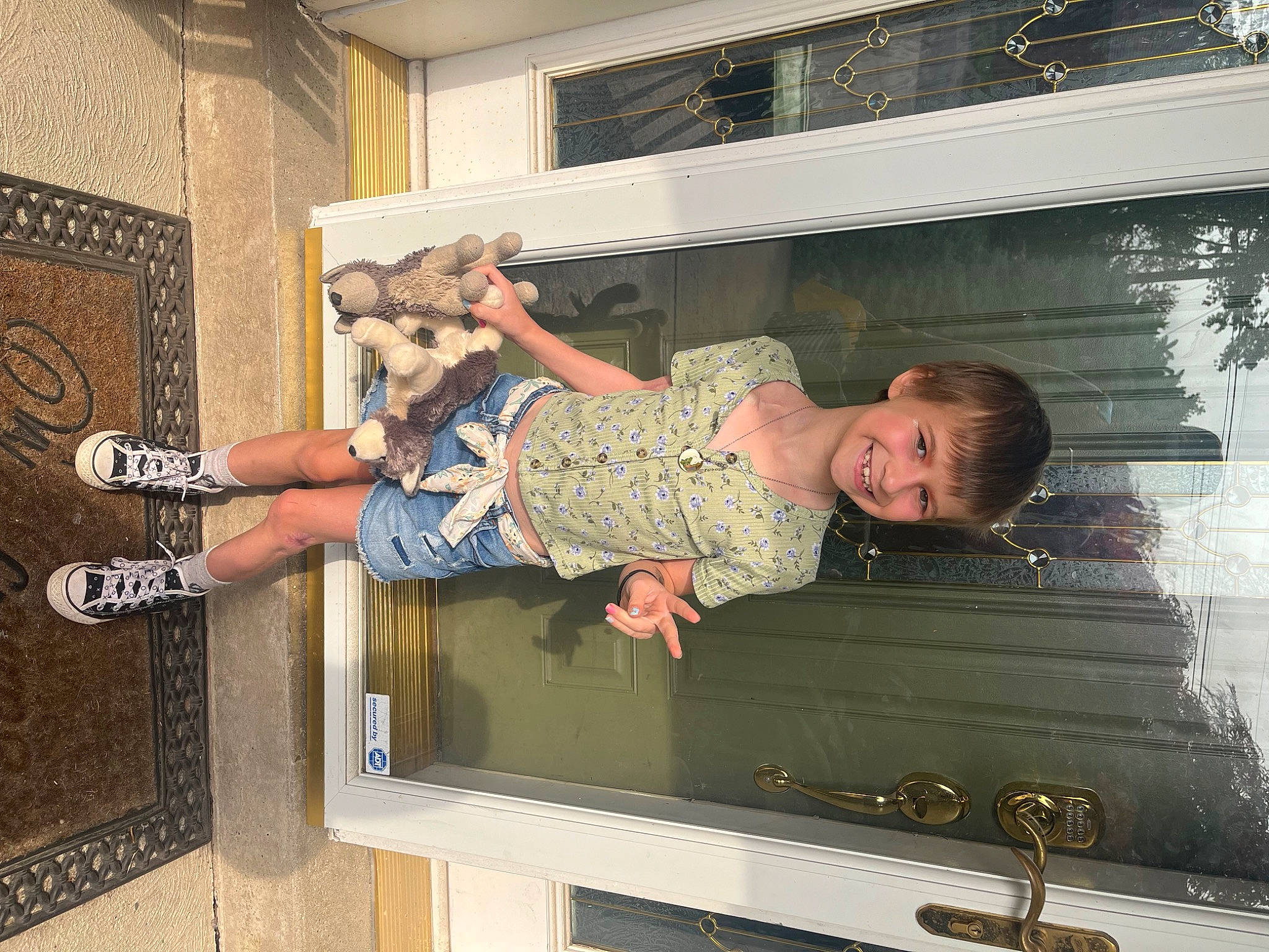 Melody is registered to the contest to win money with this photo: baby_toddler_clothing, child, fun, human_leg, joy, person, rectangle, room, smile, t_shirt, thigh, toddler, wood, wrist