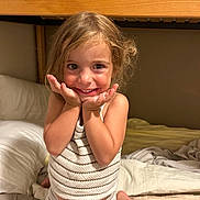 Helena participe au concours pour gagner de l'argent avec cette photo : child, smiling, bed, blanket, pillow, indoor, happy, cute, person, clothing, knitwear, face, hair, skin, expression, portrait, toddler, home, cozy, playful