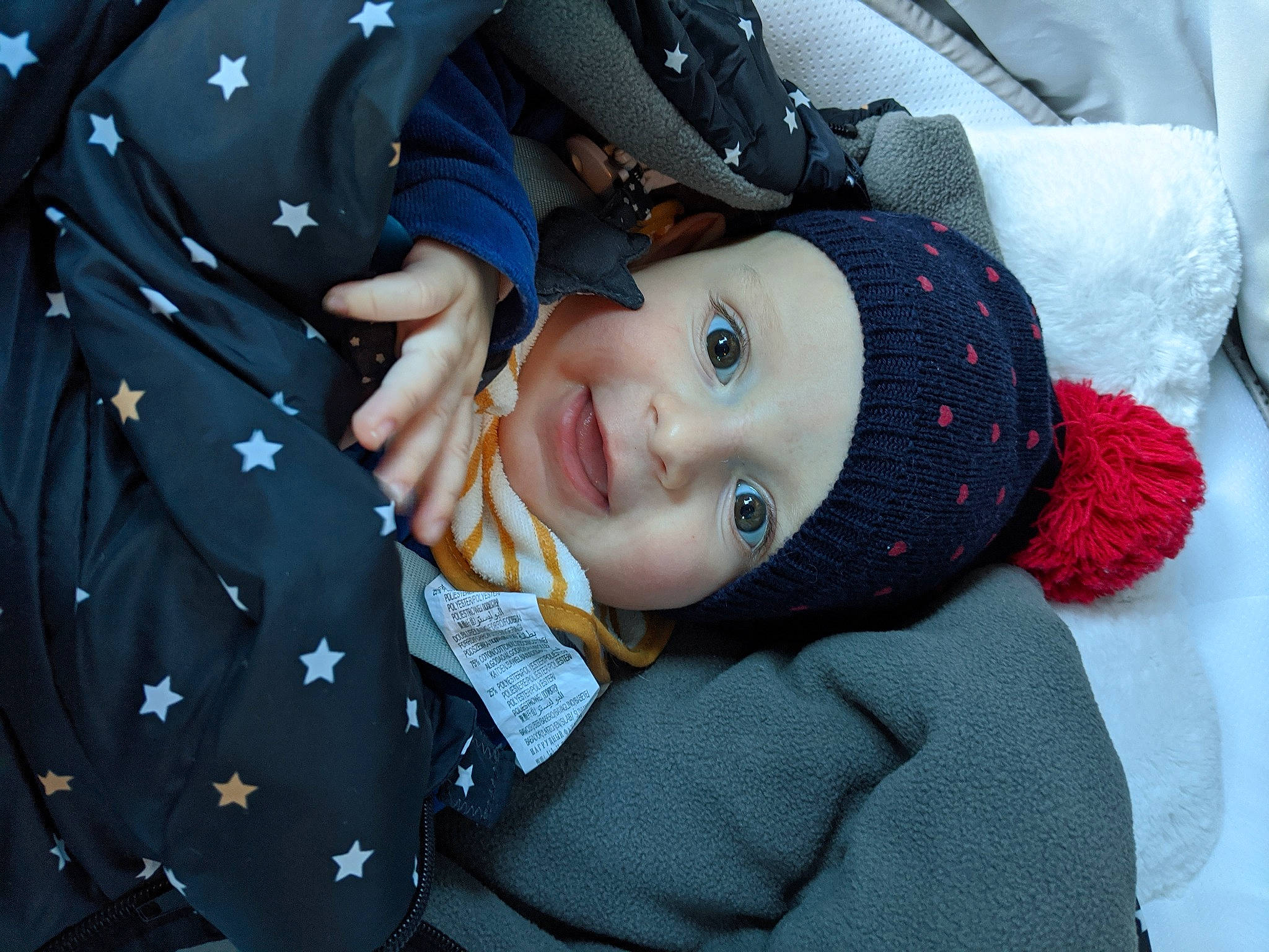 Adrien participe au concours pour gagner de l'argent avec cette photo : baby, baby_toddler_clothing, cap, cheek, child, cool, electric_blue, flash_photography, fun, happy, headwear, iris, lip, nose, outerwear, pattern, person, skin, sleeve, smile