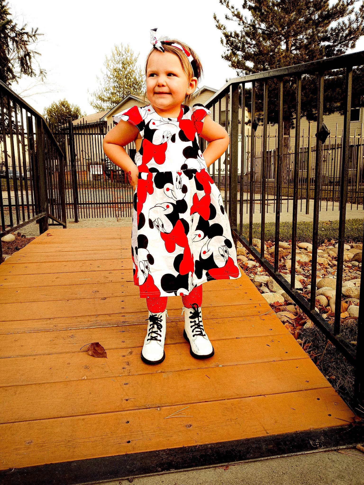 Kenleigh joined the competition — help win amazing prizes! baby_toddler_clothing, child, dress, fence, flash_photography, fun, grass, happy, joy, leisure, one_piece_garment, people_in_nature, person, plant, sky, sleeve, standing, street_fashion, tints_and_shades, toddler