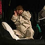 baby, sleeping, stroller, pajamas, blanket, infant, child, rest, cozy, black, soft, comfort, cute, indoors, person, newborn, peaceful, toddler, clothing, carseat