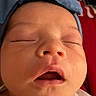 Leilani is registered to the contest to win money with this photo: baby, close_up, sleeping, headband, mouth_open, face, newborn, infant, skin, peaceful, portrait, child, young, soft, cute, human, expression, indoors, head, resting