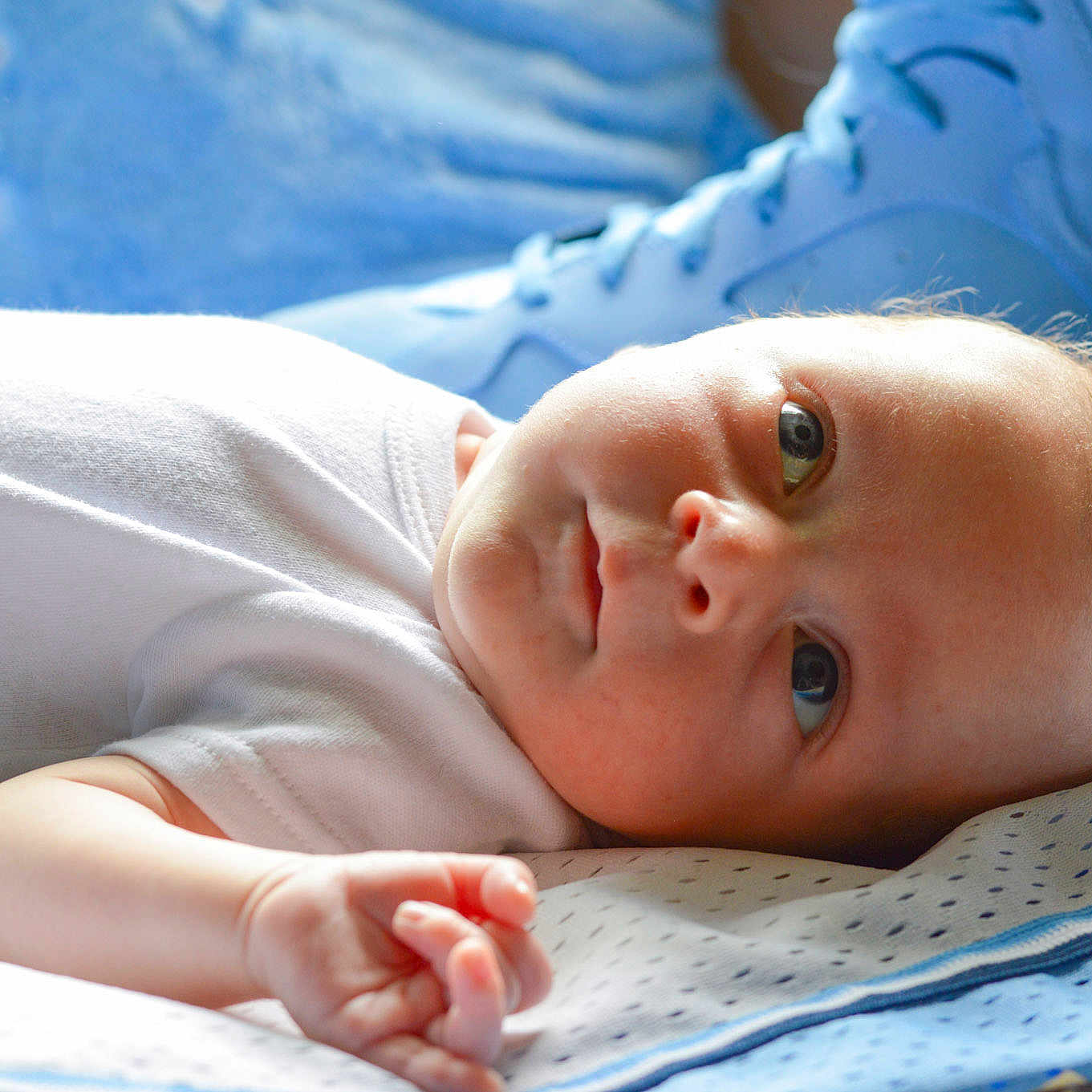 Jordan is registered to the contest to win money with this photo: baby, baby_toddler_clothing, cheek, child, chin, comfort, eye, eyebrow, happy, hat, head, iris, linens, lip, mouth, nose, room, skin, sleeve, toddler