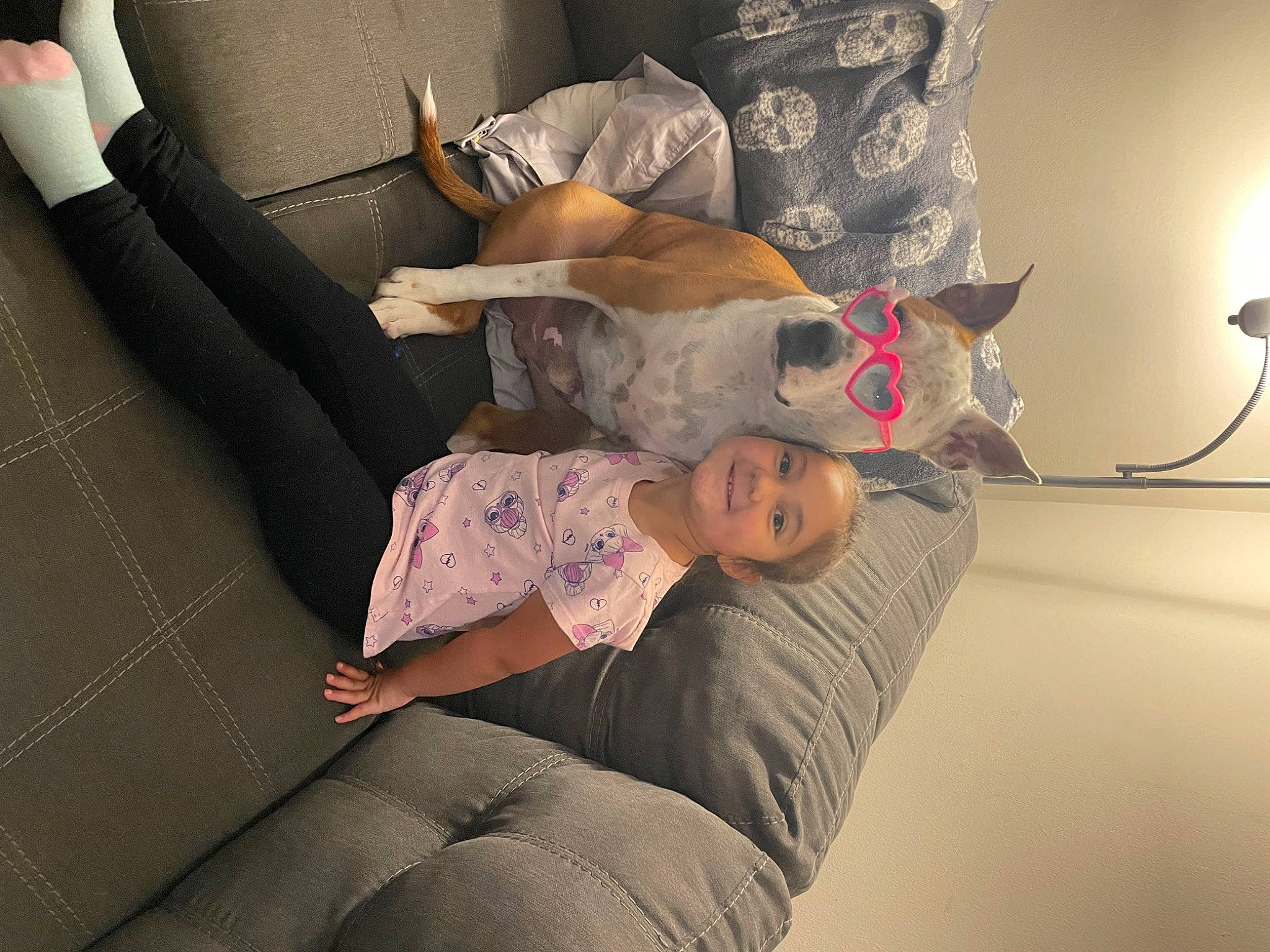 Fendi joined the competition — help win amazing prizes! barefoot, child, comfort, couch, elbow, finger, flesh, foot, fun, hat, human_leg, knee, lap, linens, room, sitting, sock, thigh, tree, wrist