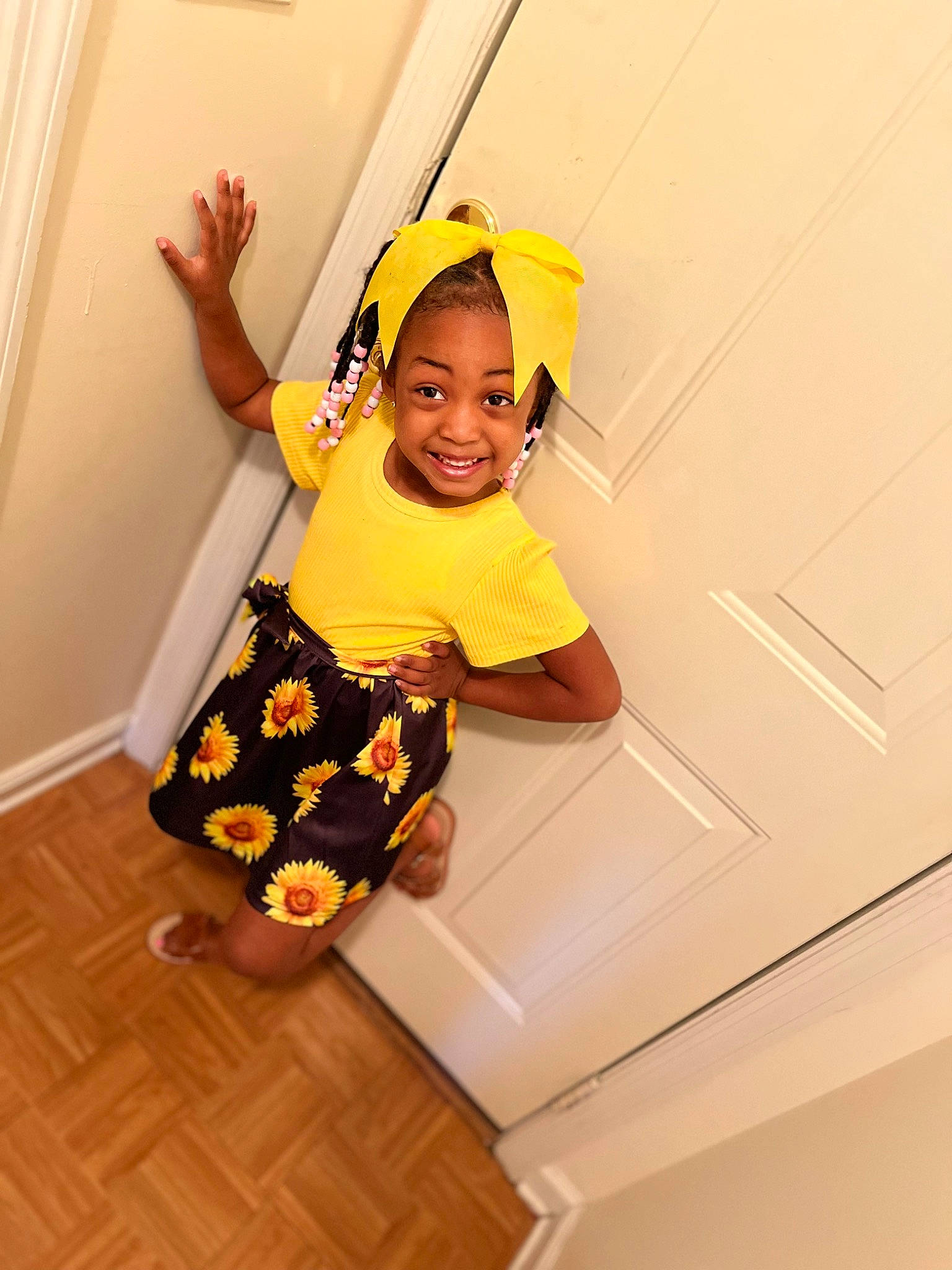 Jaysonnah is registered to the contest to win money with this photo: baby_toddler_clothing, beauty, child, costume, flooring, fun, happy, hat, human_leg, joy, knee, orange, person, room, sleeve, smile, sock, t_shirt, thigh, toddler