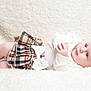 Isabella joined the competition — help win amazing prizes! baby, infant, child, blanket, plaid_skirt, white_top, soft_texture, lying_down, cute, curious, skin, hands, face, blue_eyes, red_hair, indoors, cozy, fluffy, portrait, clothing