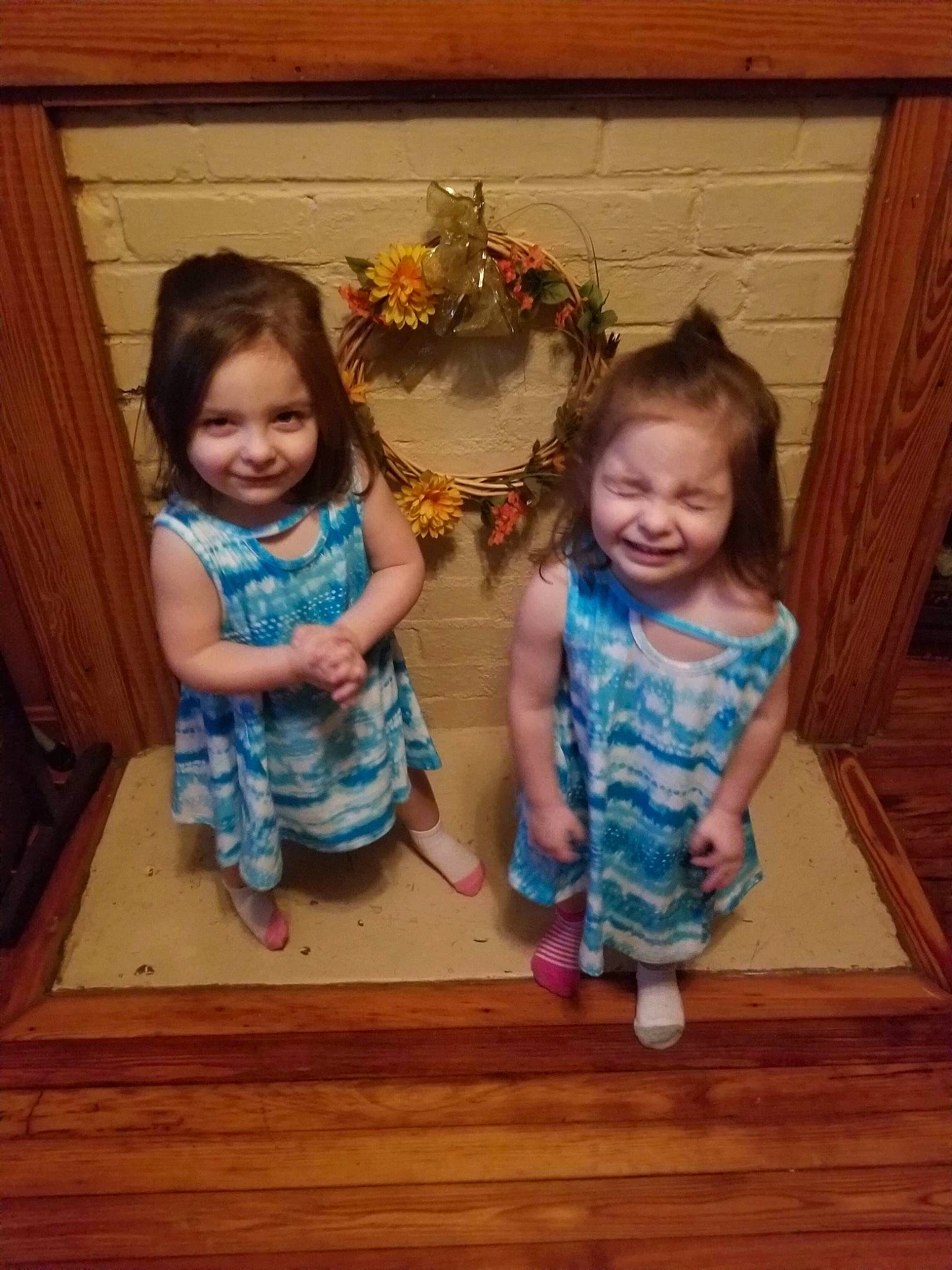 Ivory And Joyce is registered to the contest to win money with this photo: child, floor, flooring, fun, hardwood, joy, people, person, play, sitting, smile, standing, toddler, wood