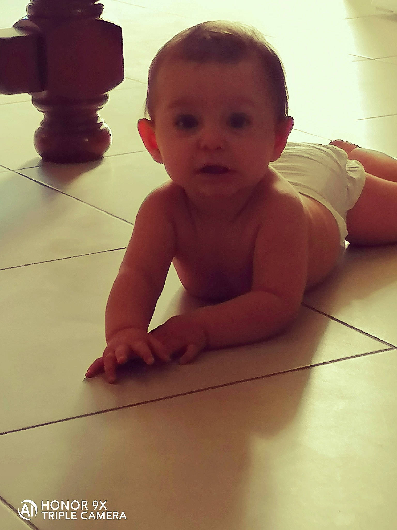 Cataleya participe au concours pour gagner de l'argent avec cette photo : arm, baby, cheek, child, crawling, eye, finger, floor, flooring, hand, head, joint, leg, mouth, muscle, person, skin, standing, surprise, thumb