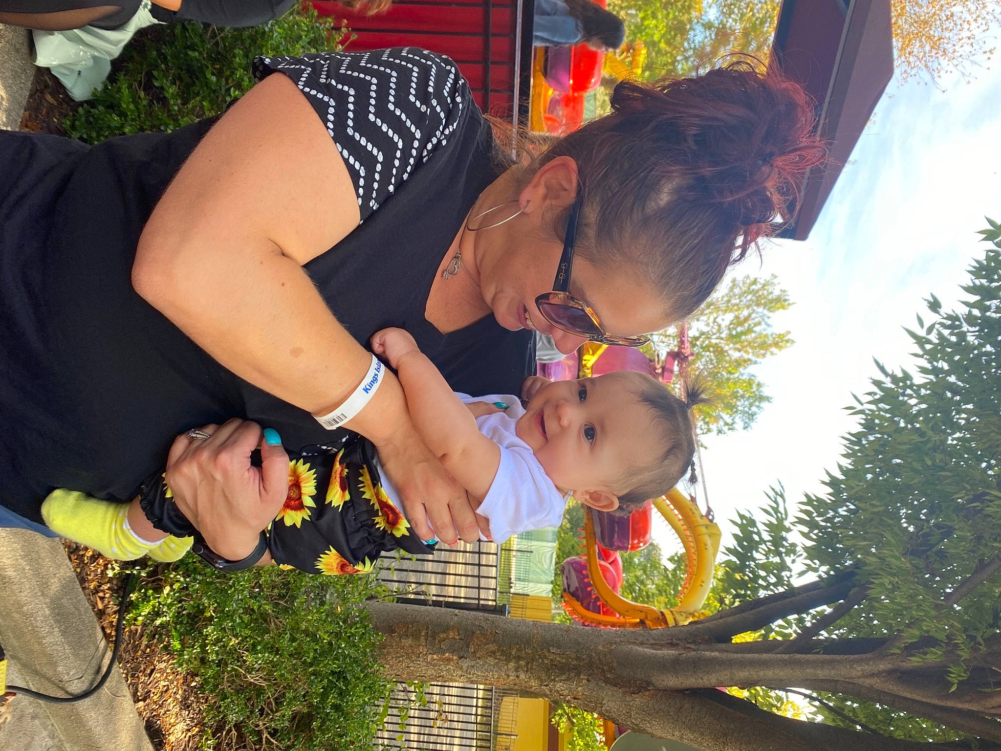 Anastasia is registered to the contest to win money with this photo: baby, child, dress, event, fun, garden, grass, happy, interaction, leisure, people_in_nature, person, plant, play, recreation, sandal, sky, spring, thigh, toddler