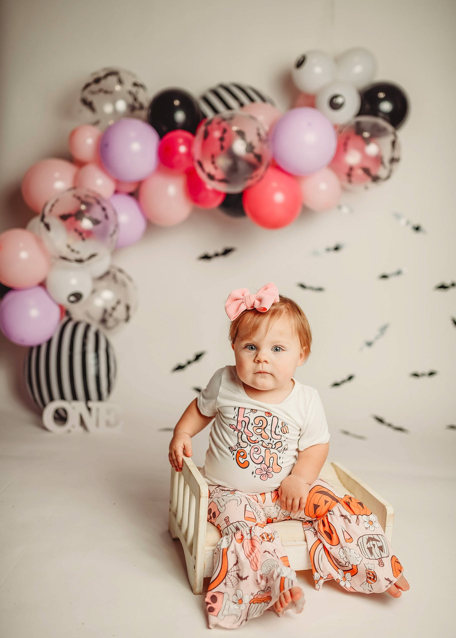 Remington is registered to the contest to win money with this photo: art, baby, baby_toddler_clothing, child, design, dress, event, fashion_accessory, font, happy, jewellery, magenta, party_supply, pattern, peach, person, pink, souvenir, sweetness, toddler