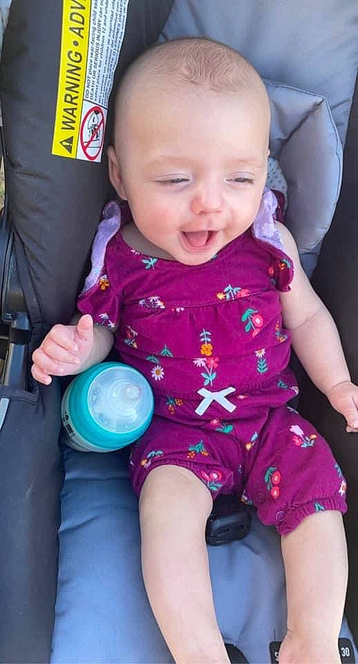 Frances joined the competition — help win amazing prizes! arm, baby, baby_toddler_clothing, cheek, child, facial_expression, finger, hand, happy, head, iris, mouth, organ, person, pink, product, skin, sleeve, smile, standing