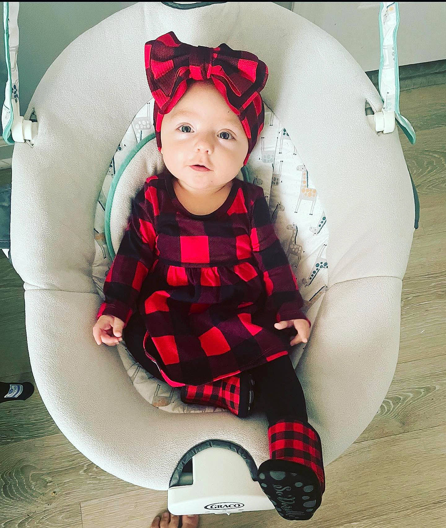 Frances joined the competition — help win amazing prizes! baby, baby_carriage, baby_products, baby_toddler_clothing, carmine, child, comfort, costume, costume_hat, fashion_accessory, fictional_character, fun, headwear, magenta, pattern, person, sitting, sleeve, sock, t_shirt