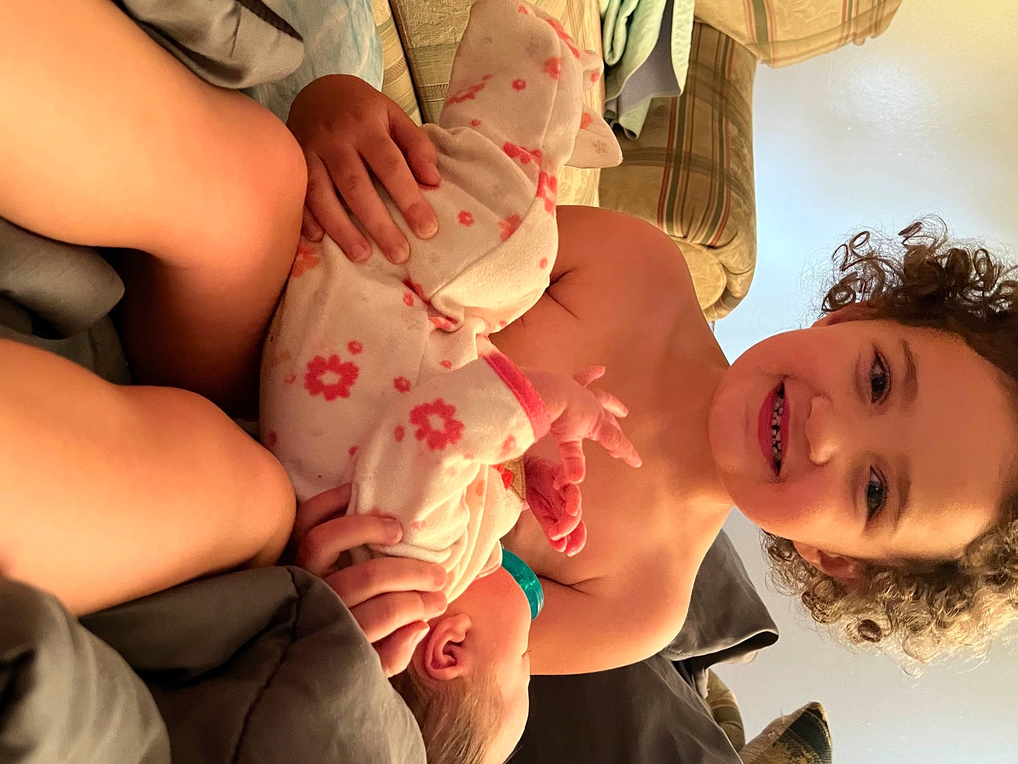 Annabella is registered to the contest to win money with this photo: abdomen, baby, chest, event, finger, flash_photography, fun, gesture, hand, happy, hat, human_leg, joy, mouth, nail, person, skin, smile, thigh, thumb