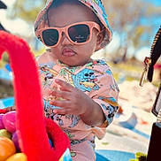 Zack joined the competition — help win amazing prizes! toddler, child, sunglasses, bucket_hat, mickey_mouse, colorful_clothing, outdoor, basket, plastic_eggs, summer, sunny, playing, cute, fashion, portrait, baby, hand, toy, fun, holiday