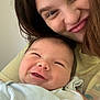 Uriah is registered to the contest to win money with this photo: baby, smiling, adult, woman, child, face, portrait, happy, indoor, closeup, person, family, casual, cute, skin, head, clothing, love, together, joy