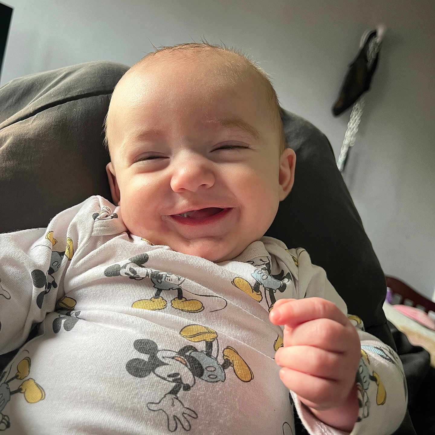 Ryan is registered to the contest to win money with this photo: baby, babylaughing, bodypart, chair, cushion, face, finger, fist, furniture, hand, happy, head, homedecor, laughing, newborn, person, photography, portrait, smile, wrist