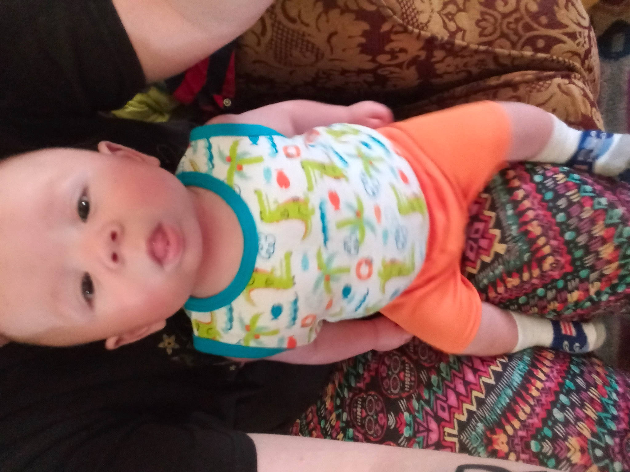 Cooper joined the competition — help win amazing prizes! arm, baby, baby_products, baby_toddler_clothing, cheek, child, elbow, happy, human_leg, iris, lip, mouth, nose, pattern, person, pink, sitting, skin, sleeve, toddler