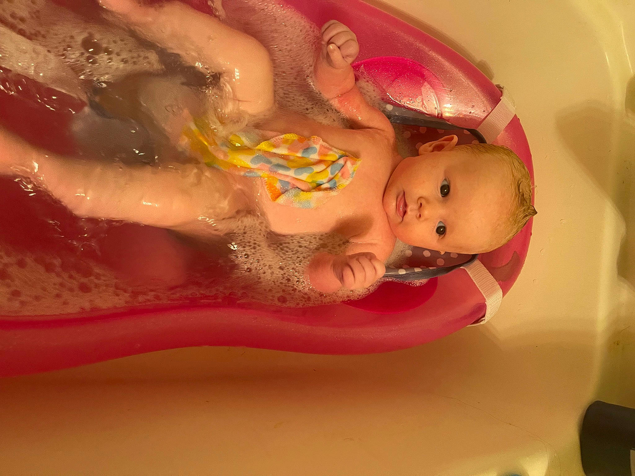 Journi joined the competition — help win amazing prizes! baby, baby_bathing, bathing, bathtub, cheek, chest, close_up, eye, finger, fun, happy, leisure, lip, magenta, mouth, person, pink, skin, smile, toddler