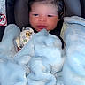 newborn, baby, blanket, car_seat, infant, face, head, clothing, cute, cozy, heart, love, soft, warm, child, portrait, indoors, newborn_baby, wrapped, baby_girl_or_boy