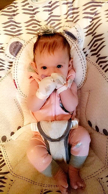 Brinleigh is registered to the contest to win money with this photo: baby, baby_products, baby_toddler_clothing, cheek, child, comfort, drinkware, eye, eyelash, finger, headgear, iris, linens, lip, nail, person, pink, skin, stomach, thumb