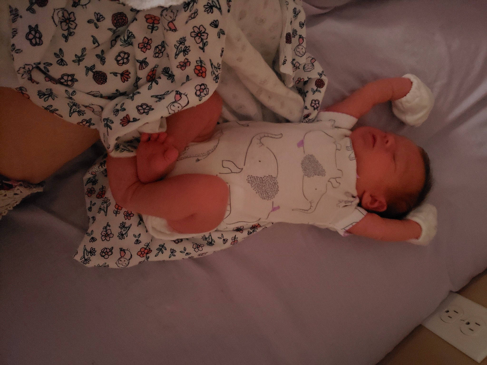 Brinleigh is registered to the contest to win money with this photo: arm, baby, baby_products, baby_toddler_clothing, child, comfort, finger, hand, human_body, human_leg, joint, leg, linens, pattern, person, skin, sleeve, stomach, textile, thigh