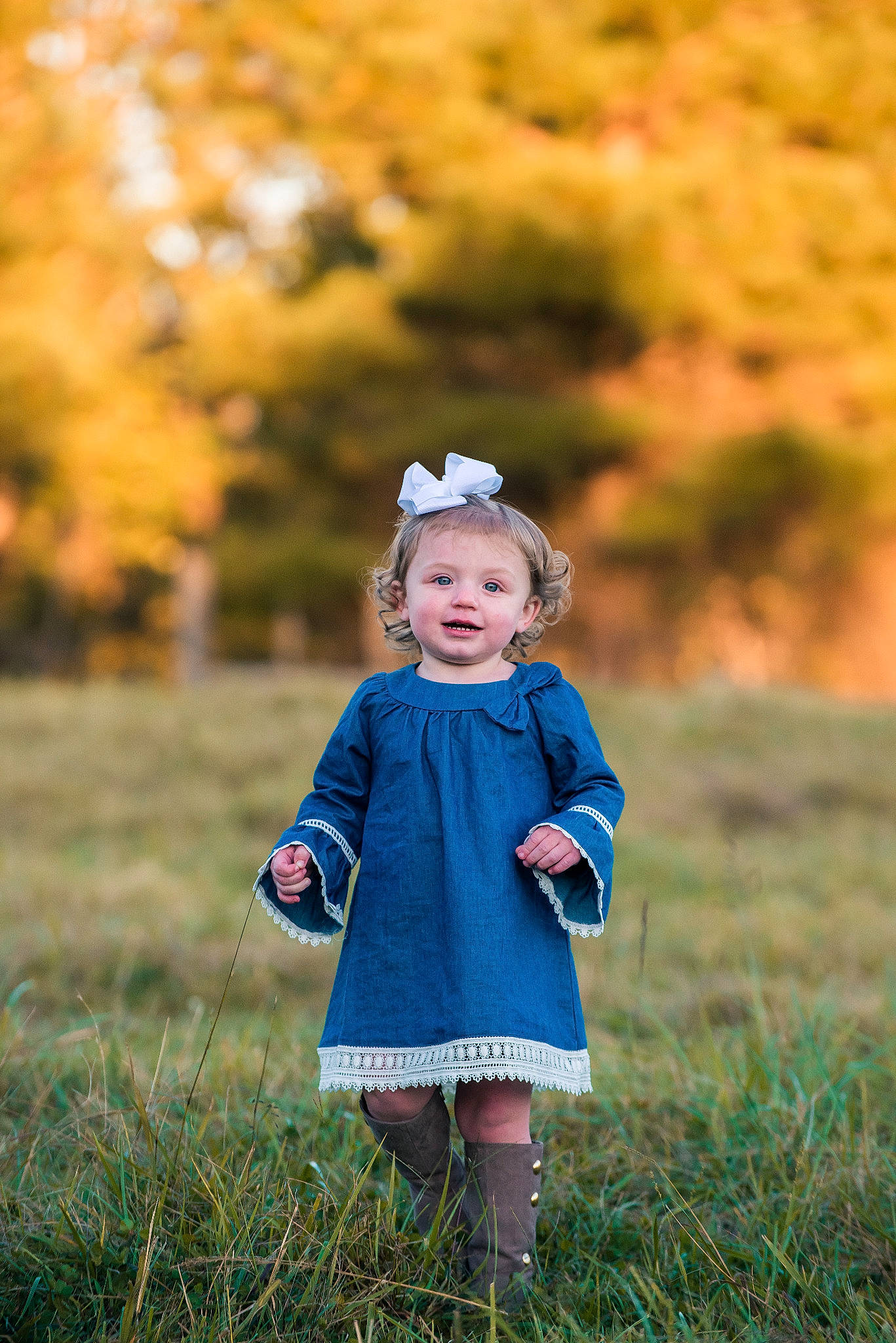 Emalyn is registered to the contest to win money with this photo: autumn, baby, blond, child, dress, family, grass, happy, leaf, meadow, people, people_in_nature, person, photograph, photography, plant, portrait, portrait_photography, toddler, tree