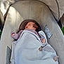 baby, newborn, blanket, stroller, sleeping, infant, soft, cozy, cushion, peaceful, child, outdoor, wrapped, resting, cute, small, face, head, clothing, babywear
