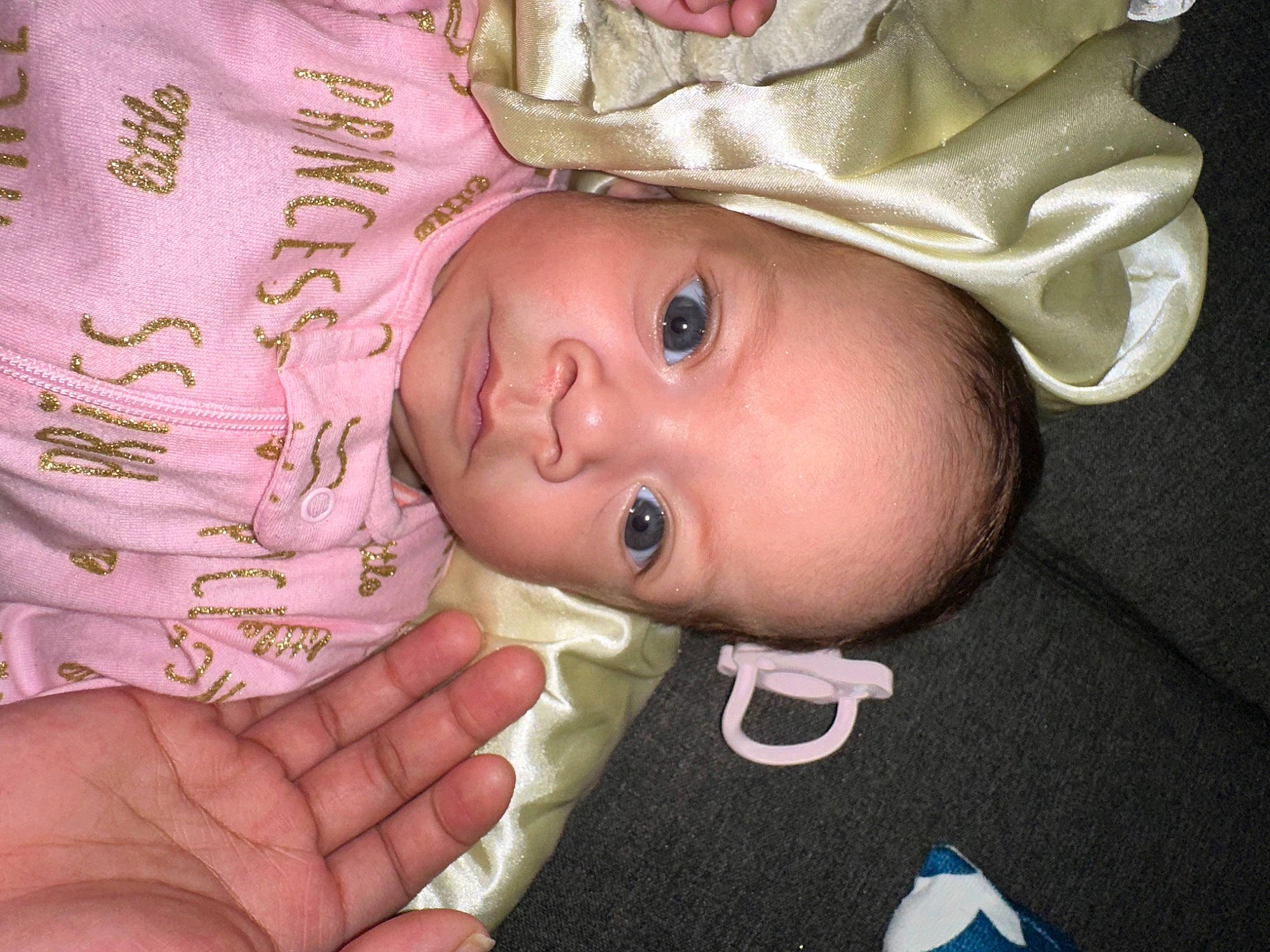 Azayla is registered to the contest to win money with this photo: baby, baby_toddler_clothing, cheek, child, chin, eye, eyebrow, eyelash, finger, hand, happy, hat, head, iris, lip, mouth, nose, person, pink, skin
