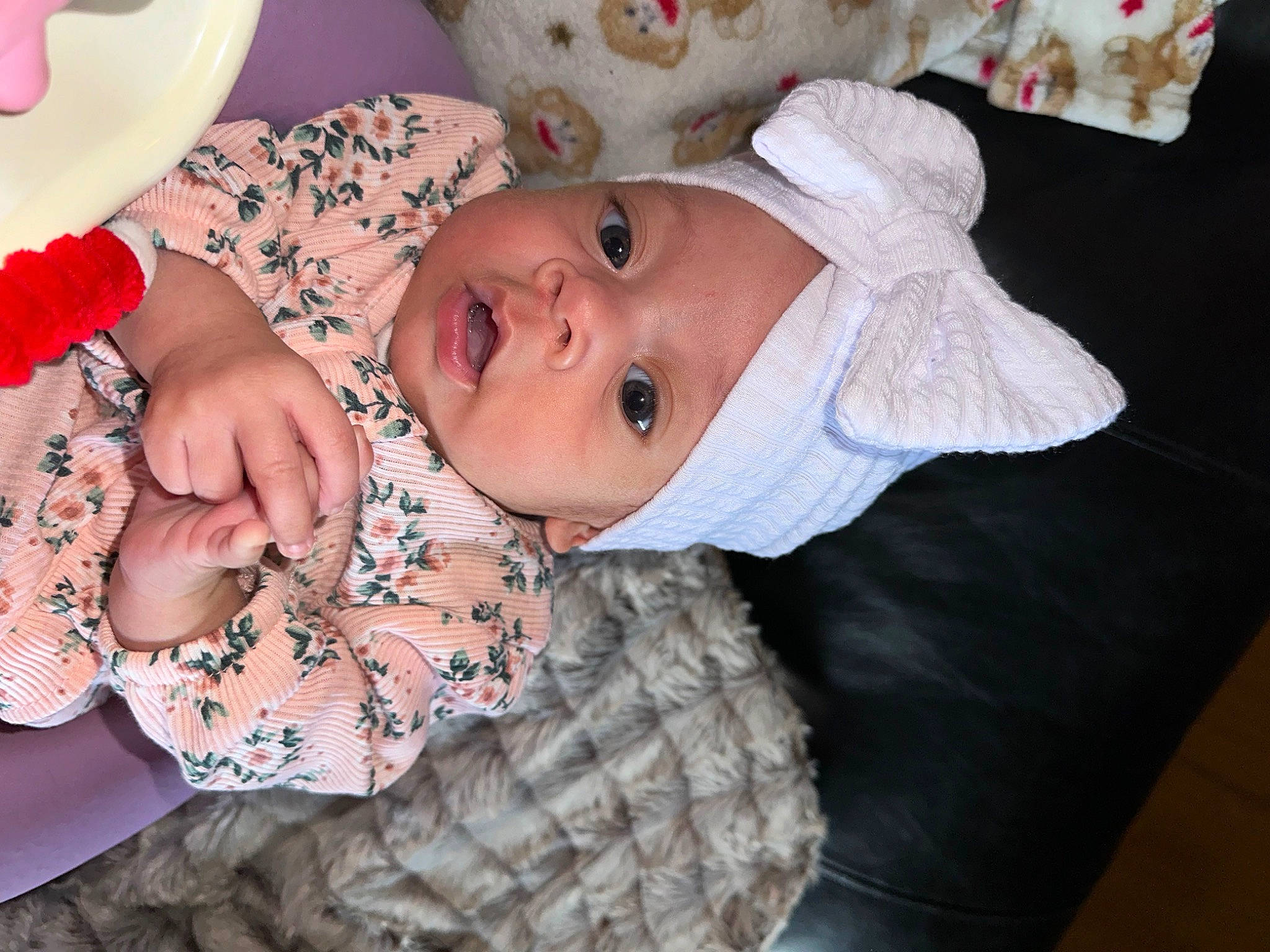 Azayla is registered to the contest to win money with this photo: baby, baby_products, baby_toddler_clothing, cheek, child, eyelash, fashion_accessory, happy, hat, headwear, iris, lip, mouth, nail, nose, pattern, person, pink, skin, sleeve