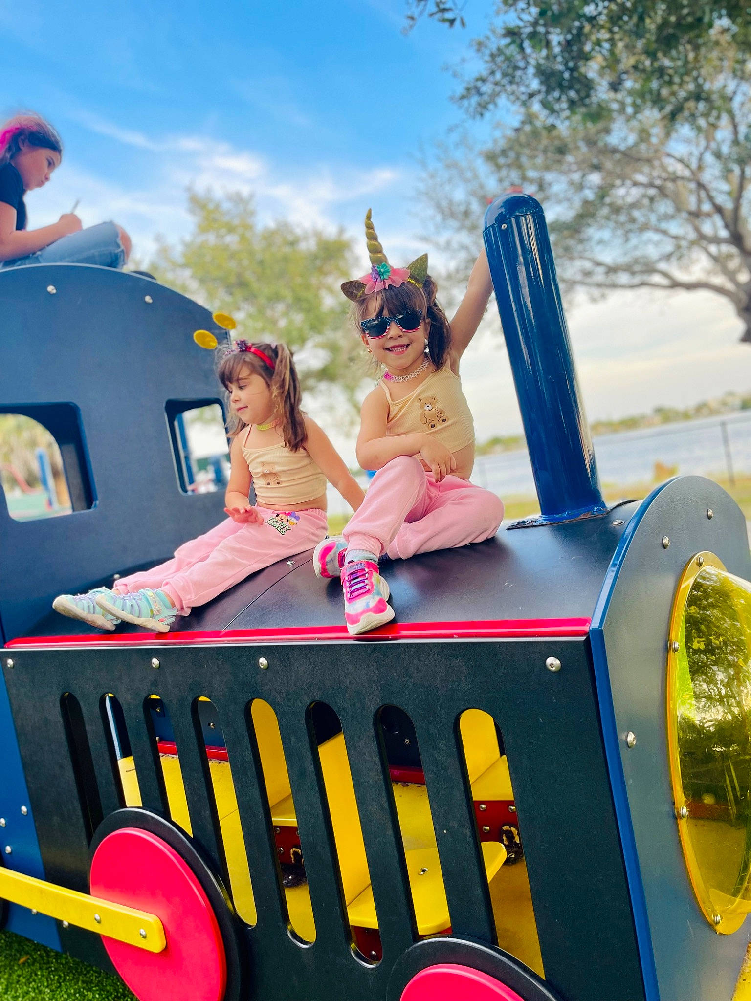 Valeria Victoria is registered to the contest to win money with this photo: auto_part, automotive_design, automotive_exterior, blue, bumper, cloud, dress, event, fictional_character, fun, games, happy, joy, leisure, motor_vehicle, person, pink, public_event, recreation, sky