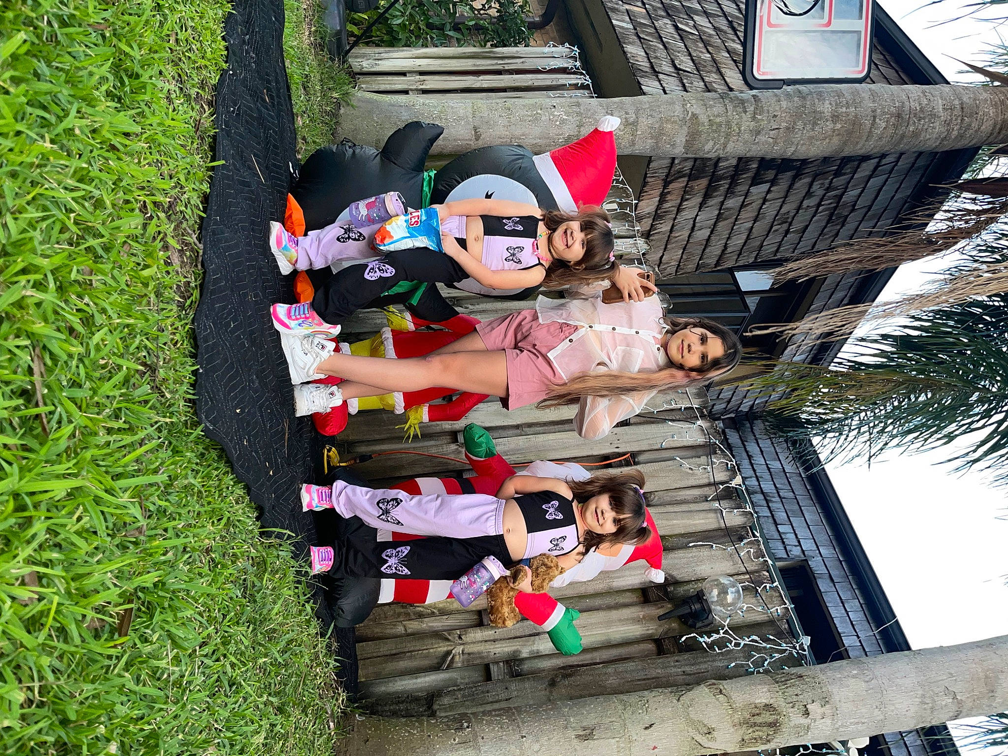 Victoria is registered to the contest to win money with this photo: animated_cartoon, art, carmine, event, fiction, fictional_character, fun, garden, grass, joy, lawn_ornament, leisure, palm_tree, person, plant, recreation, shrub, sky, tree