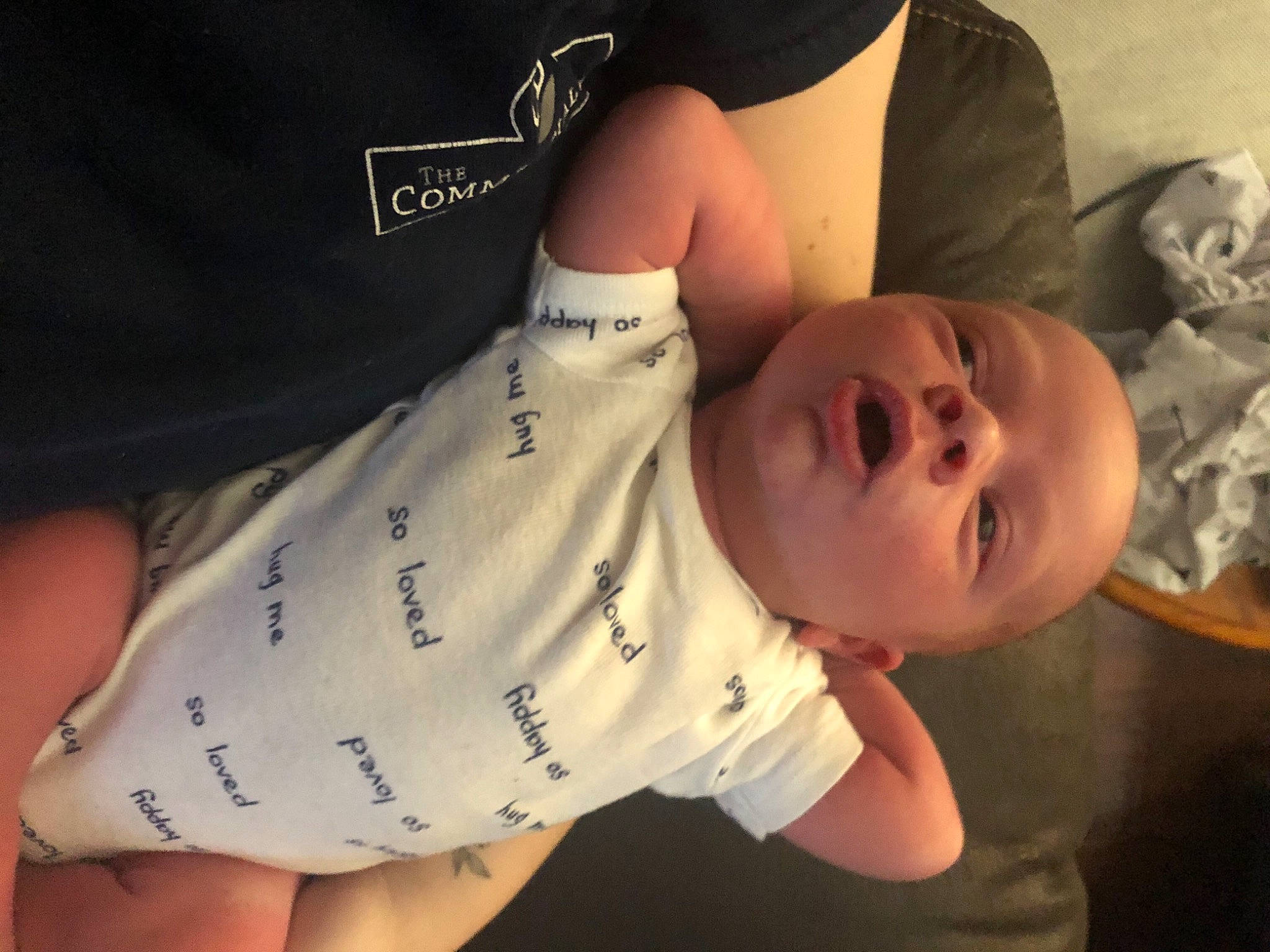 Kaizer is registered to the contest to win money with this photo: arm, baby, baby_toddler_clothing, cheek, chin, comfort, elbow, eyelash, facial_expression, finger, flash_photography, gesture, hand, happy, human_body, neck, nose, person, sleeve, thumb