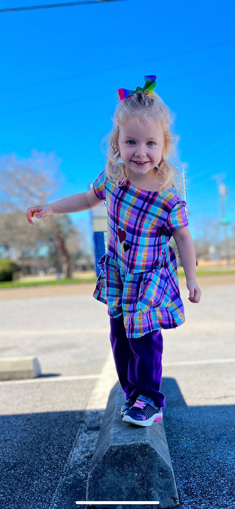 Audrey joined the competition — help win amazing prizes! asphalt, azure, blue, cool, face, fashion, gesture, happy, joy, leisure, pattern, person, pink, plaid, plant, purple, sky, sleeve, smile, standing