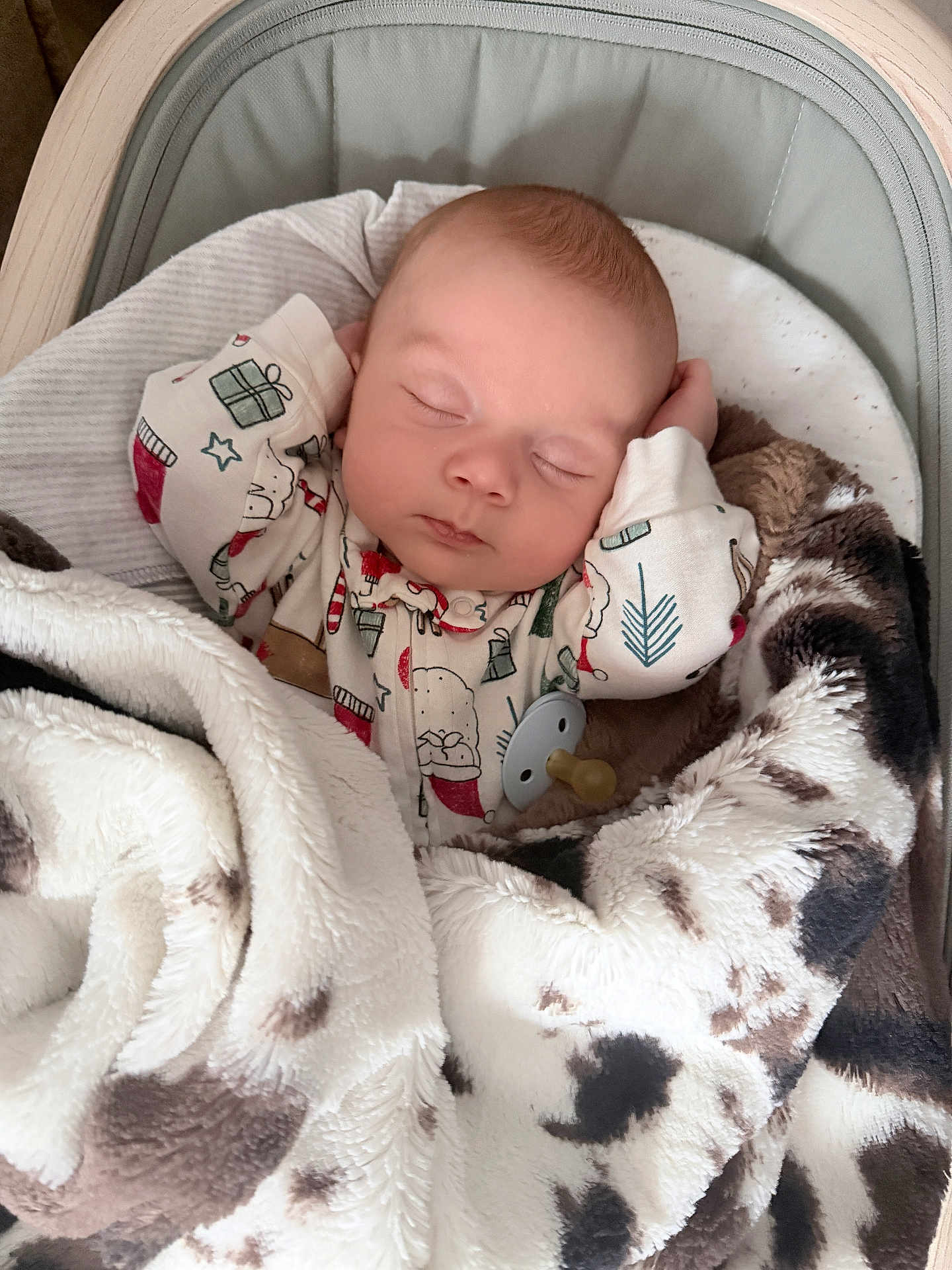 Briggs is registered to the contest to win money with this photo: baby, sleeping, blanket, onesie, pacifier, infant, cozy, cute, bed, resting, child, soft, warm, holiday, pattern, face, peaceful, cute_baby, indoors, comfort