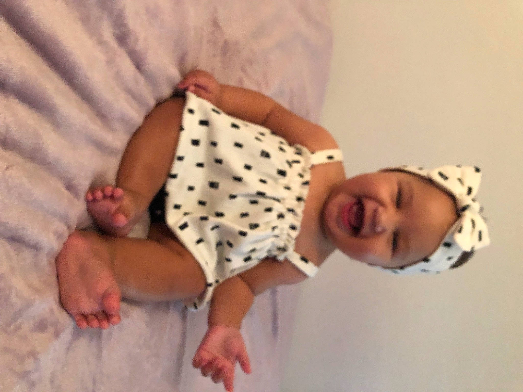 Iliana is registered to the contest to win money with this photo: baby, baby_sleeping, baby_toddler_clothing, child, collar, comfort, finger, foot, happy, headwear, joy, linens, nail, pattern, person, pink, product, room, sleeve, smile