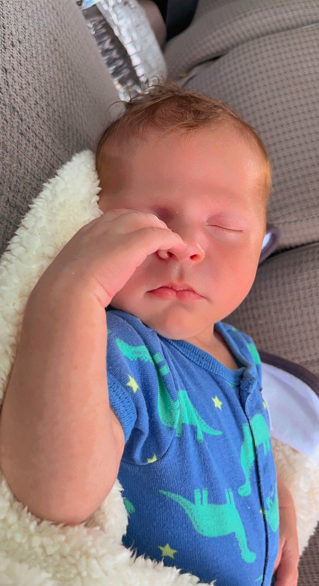 Orson is registered to the contest to win money with this photo: baby, baby_products, baby_toddler_clothing, cheek, child, chin, comfort, eyebrow, eyelash, finger, hand, iris, lip, mouth, neck, nose, person, skin, sleeve, thumb
